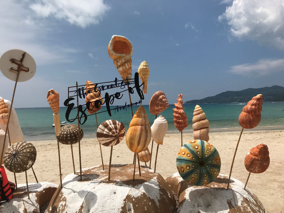 A quirky sign on the beach made of polystyrene at Phuket, Thailand.